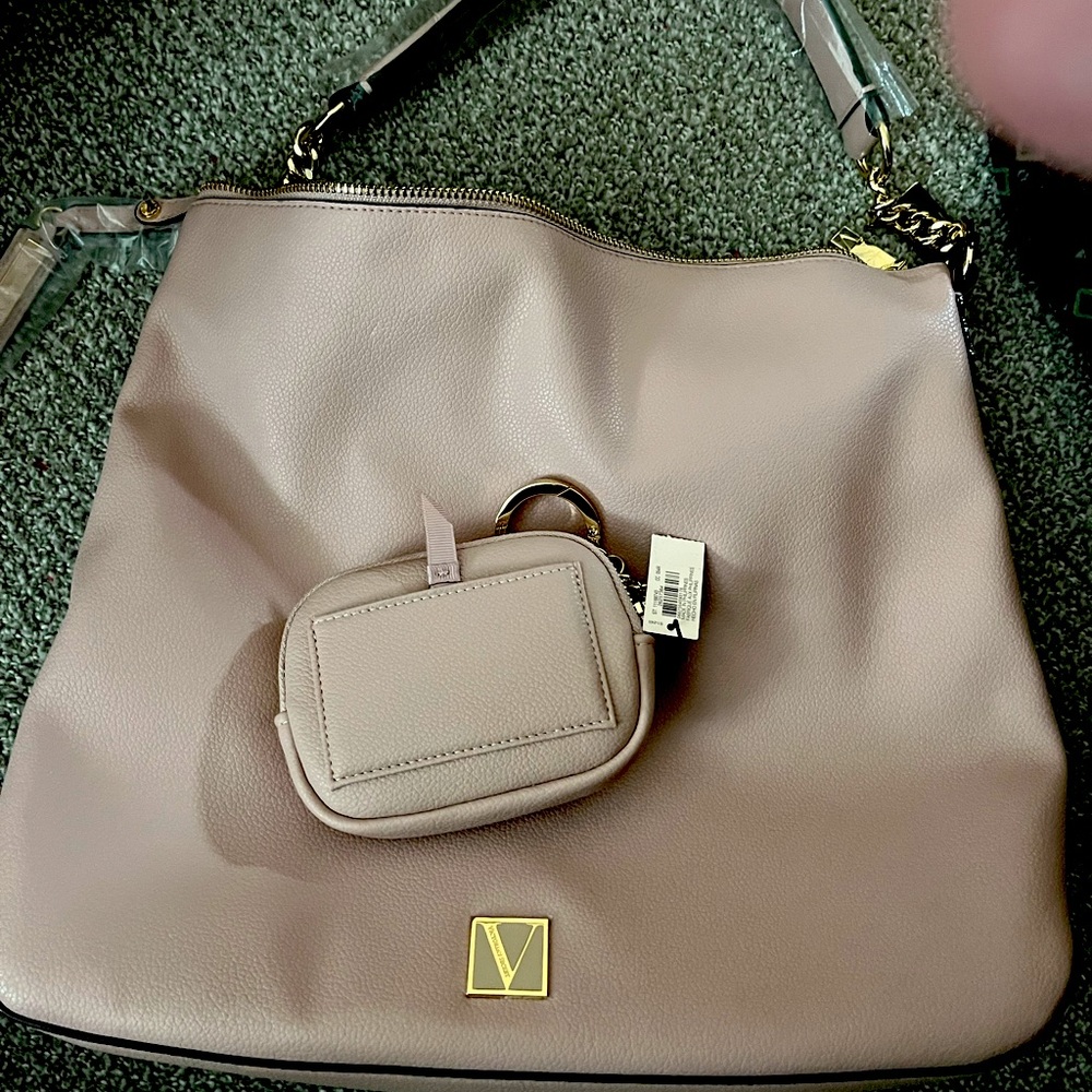 I have a brand new Victoria hand bag with matching change purse